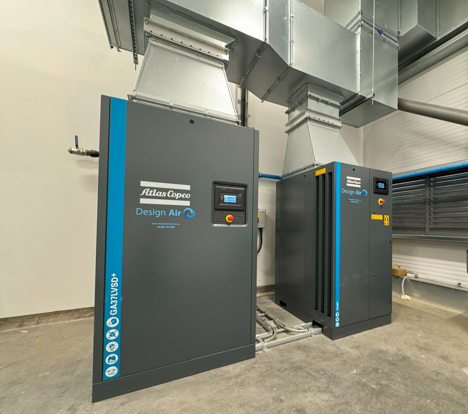 Two Atlas Copco GA37 VSD+ compressors branded Design Air installed in a Scottish plant room