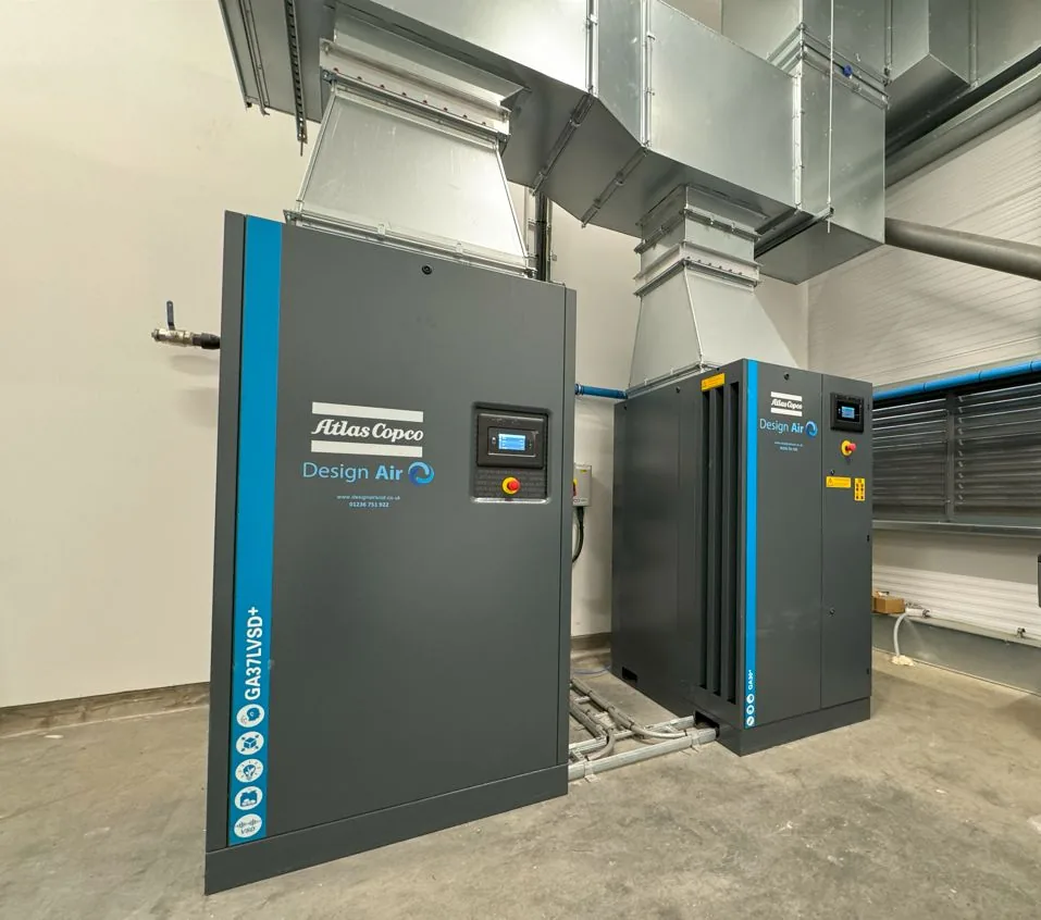 Two Atlas Copco GA37 VSD+ compressors branded Design Air installed in a Scottish plant room